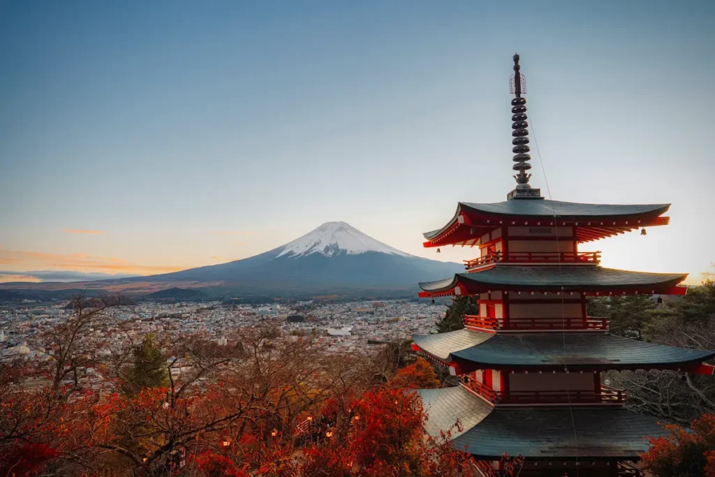 Mount Fuji and Chureito Pagoda at sunset overlooking Fujiyoshida city in Japan