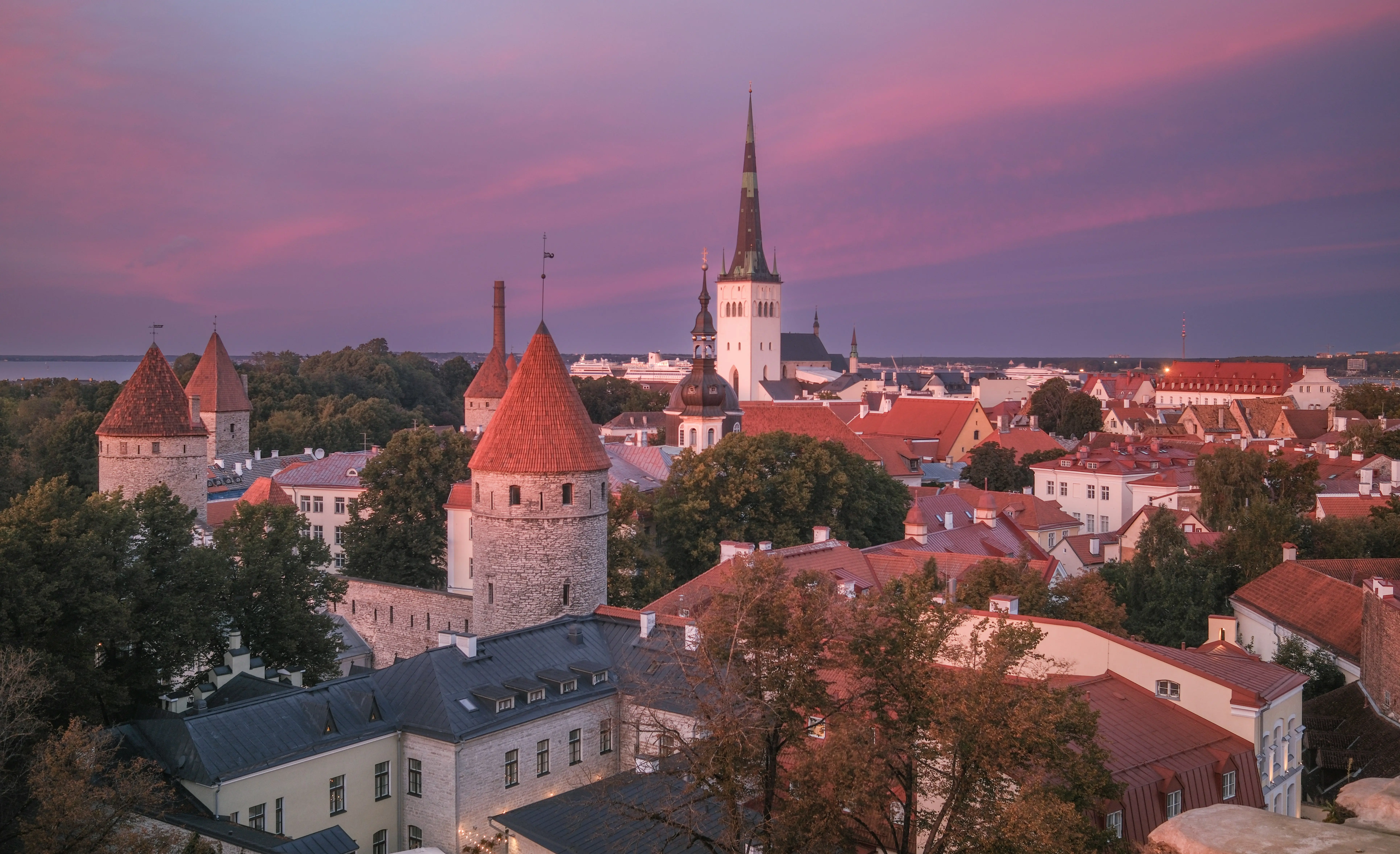Tallinn Old Town skyline at sunset Estonia red roofs and medieval towers best eSIM for Estonia 2026