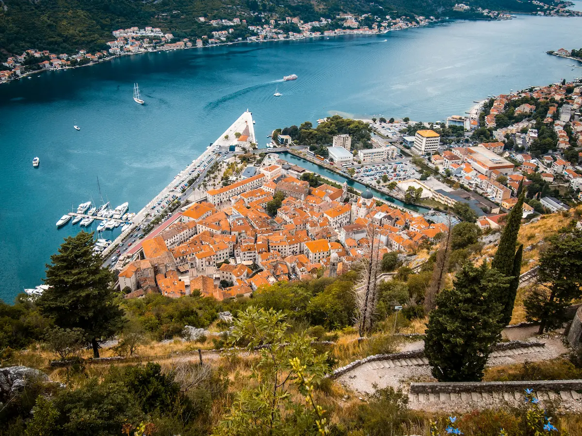 Kotor Bay Montenegro aerial view with old town coastline and mountains best esim coverage 2026